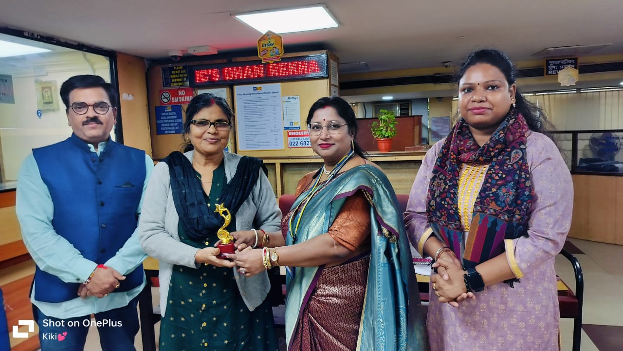 car interior from central back seat position showing driver and blurred view through windscreen of a busy road at night