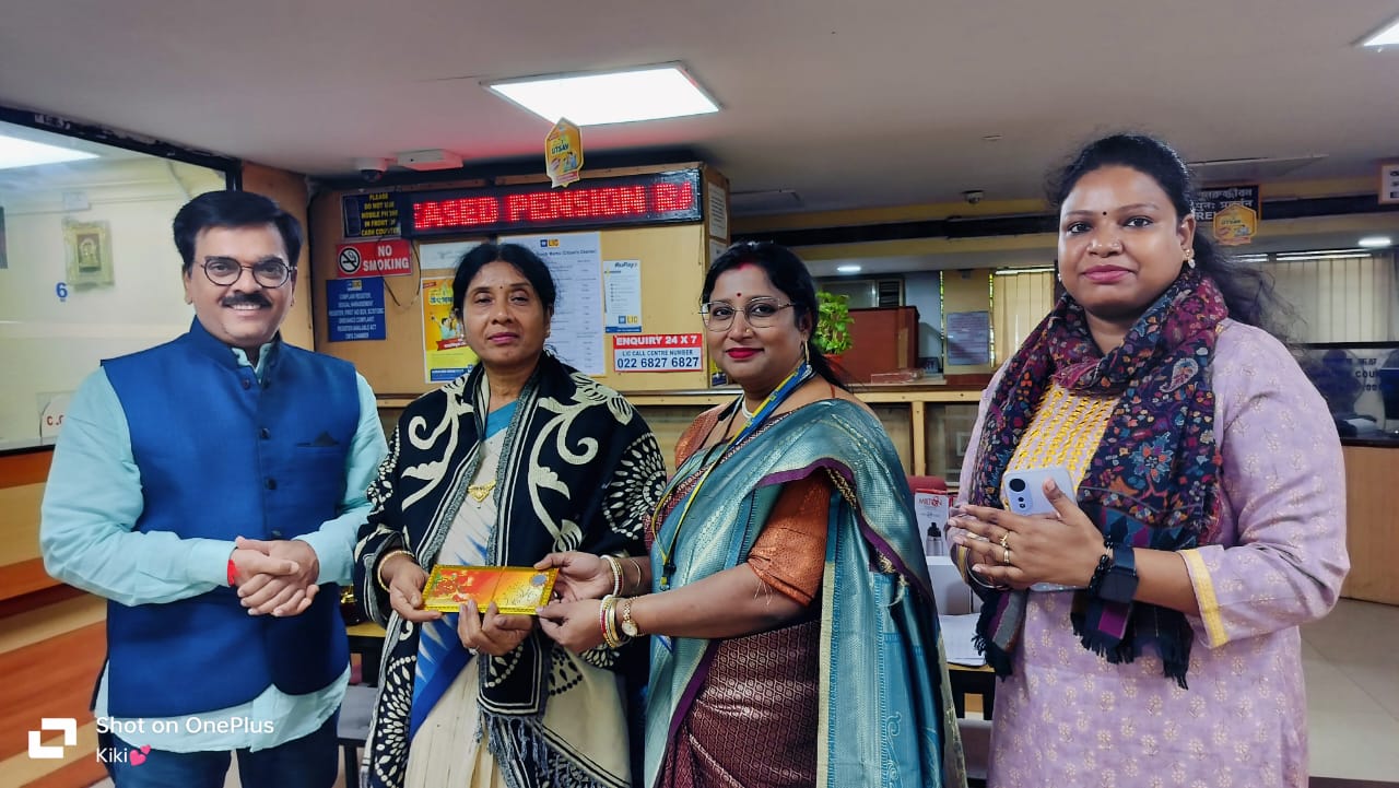 car interior from central back seat position showing driver and blurred view through windscreen of a busy road at night